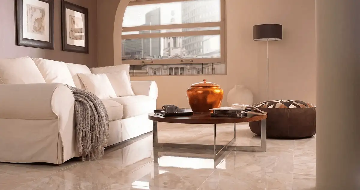 Modern living room with professionally installed marble flooring, a beige sofa, coffee table in Fargo, ND