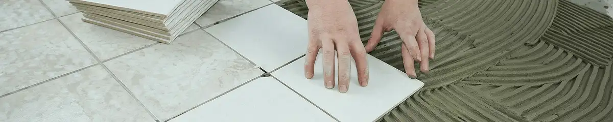 Professional installing white tile floors in Fargo, ND